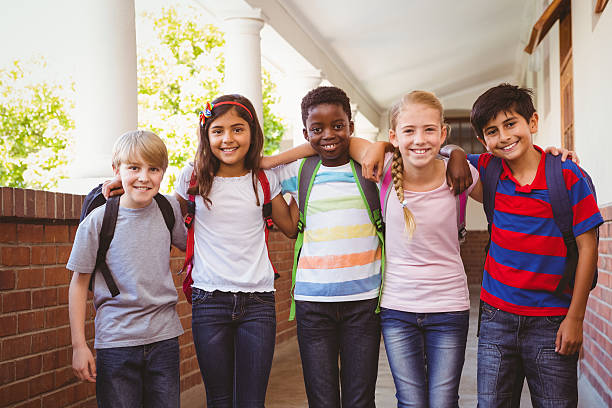 istock Little school kids in corridor 474965774