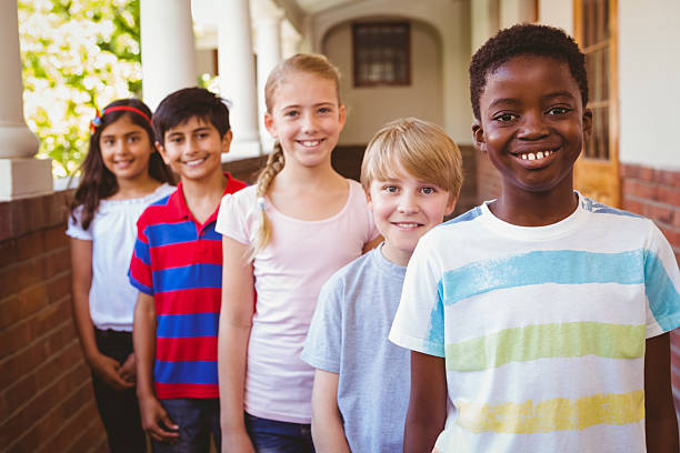 istock Little school kids in corridor 474965784