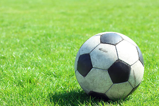 istock Old leather soccer ball 474965860