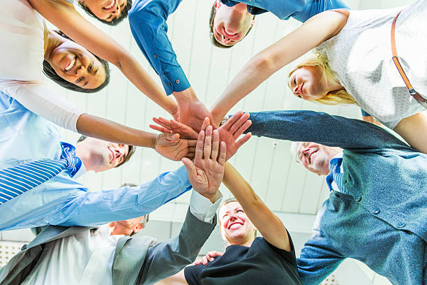 istock Working together.... hands of business team showing unity 474966044