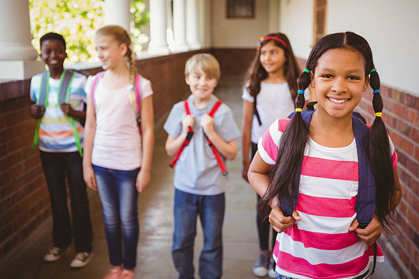 istock Little school kids in corridor 474966528