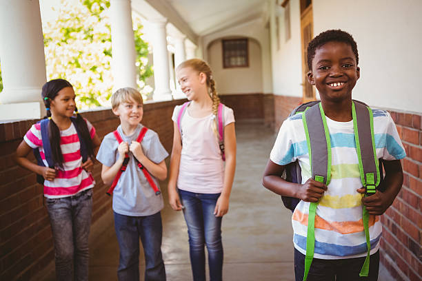 istock Little school kids in corridor 474966530
