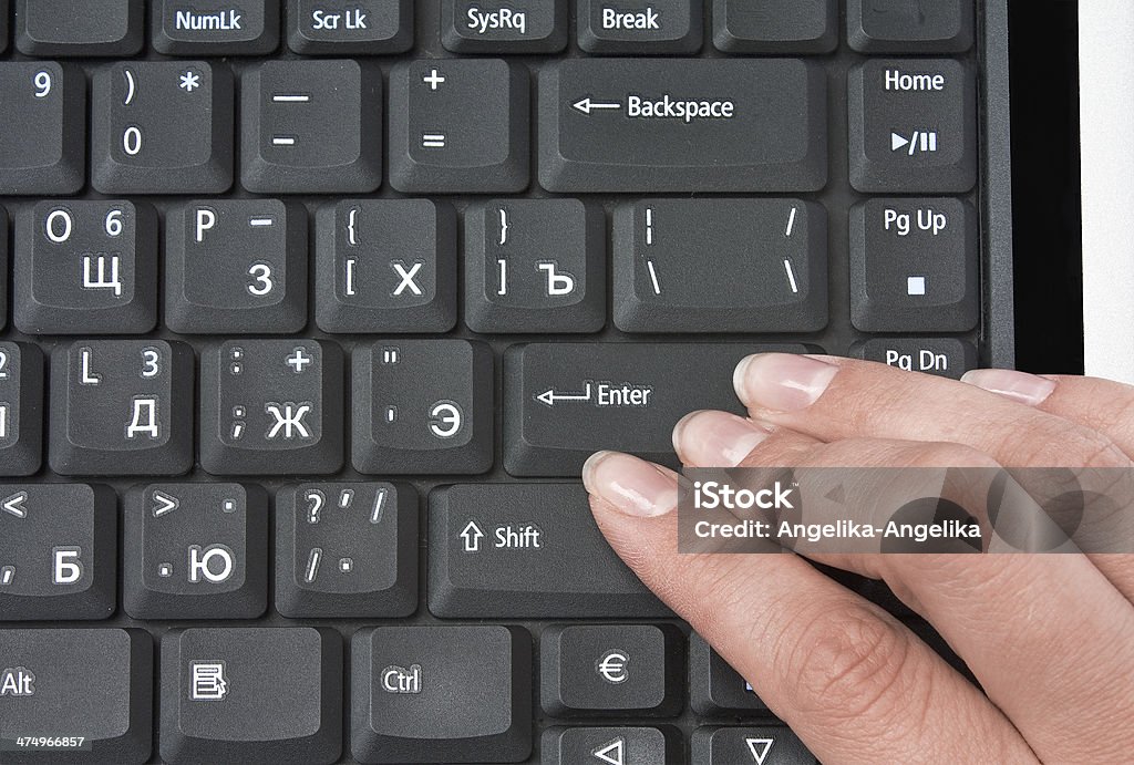 keyboard and fingers isolated keyboard and fingers with push key enter Black Color Stock Photo