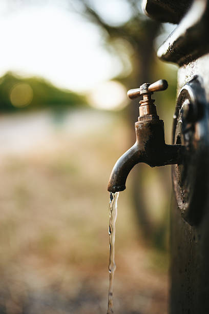 istock Water flowing with faucet 474967110