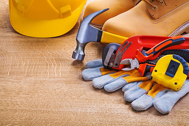 istock horizontal view helmet boots glove tapeline monkey wrench hammer 474974480