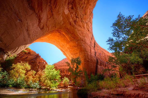 Jacob Hamblin Arch Jacob Hamblin Arch in Coyote Gulch, Grand staircase-Escalante National Monument, Utah, United States grand staircase escalante national monument stock pictures, royalty-free photos & images