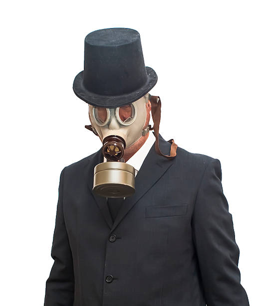 istock Businessman with gas mask and with a hat 474980110