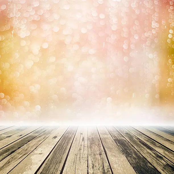 old wooden floor platform on bokeh light background