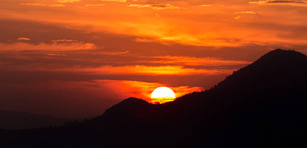 Amazing sunrise in mountain background stock photo