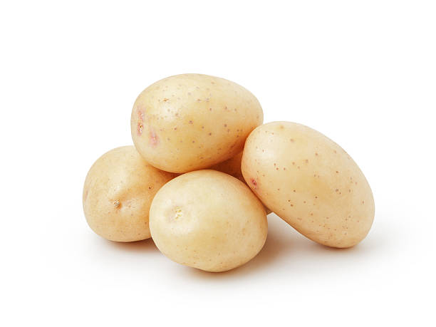 istock heap of baby potatoes isolated on white 474987380