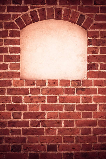 istock Arch arc niche with copy space in brick wall background 474989539