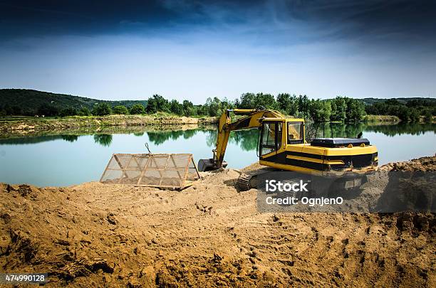 Excavator On Gravel Pit Stock Photo - Download Image Now - 2015, Activity, Backhoe