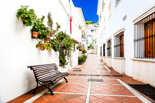 Picturesque narrow street of Rancho Domingo. Charming white village in Benalmadena. Andalusia, southern Spain
