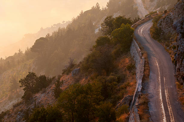 istock Empty stretch of mountain road at sunset in Bcharre, Lebanon 474992803