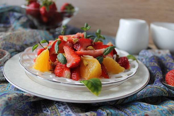 istock fruit salad with strawberries, oranges, pistachios 474993200