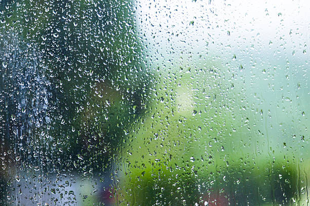 istock Colorful water drops on a glass 474993382