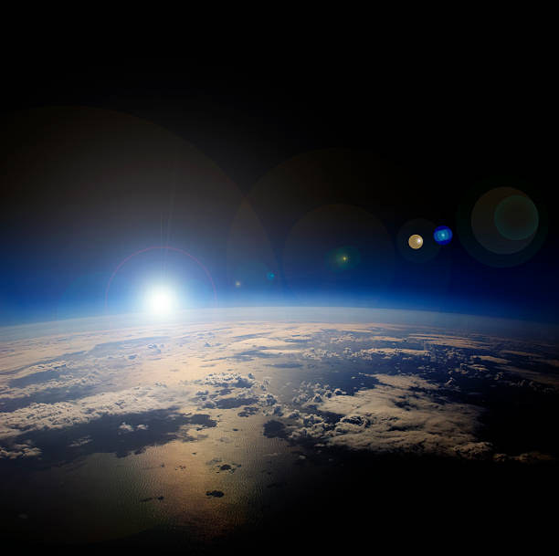 istock High altitude view of sunrise over Earth. 474997230