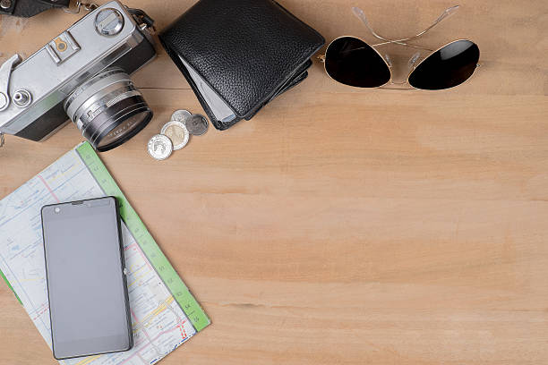 istock Vintage camera, coins, wallet, sun glasses, map and mobile 474997900