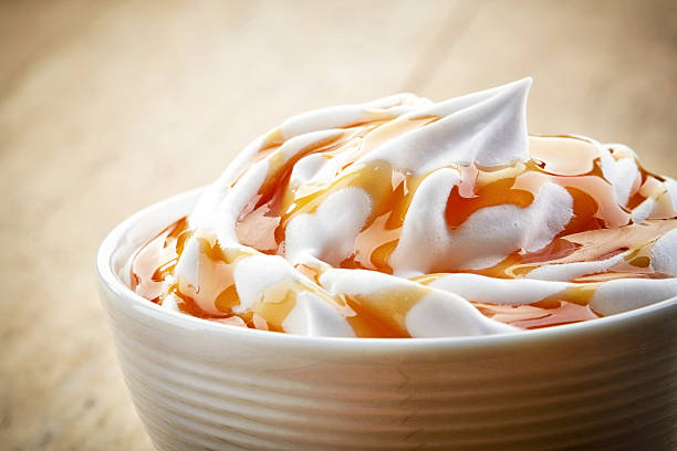 closeup of caramel latte coffee with whipped cream