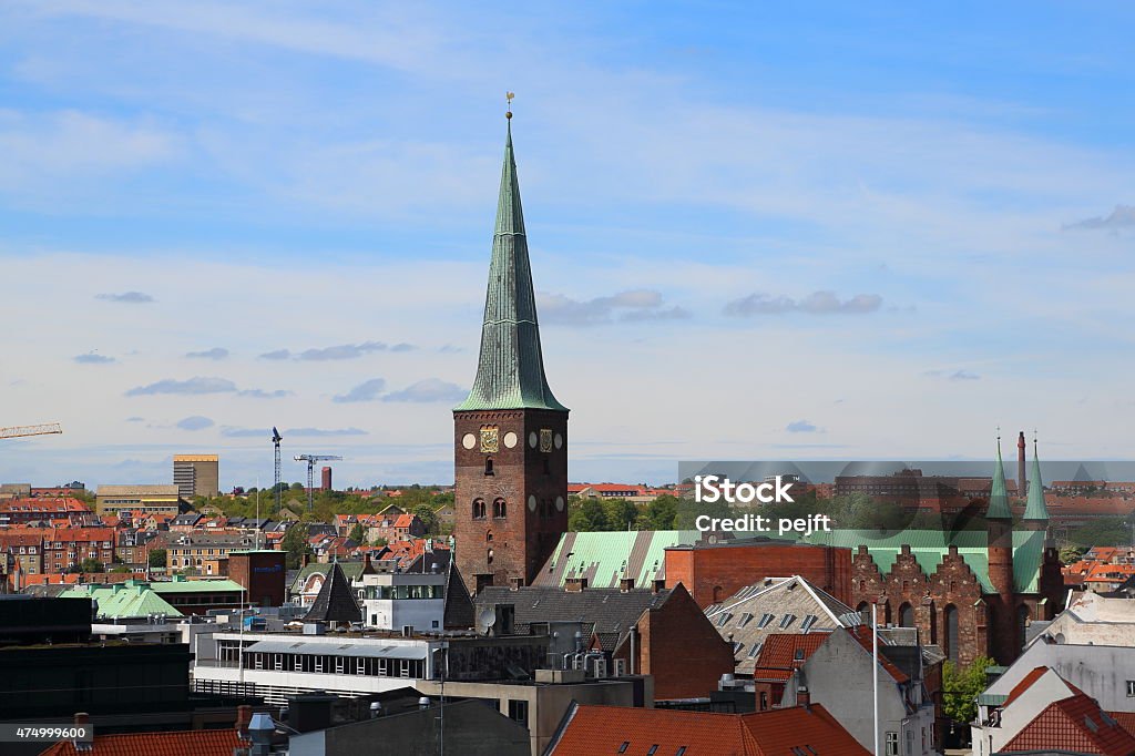 Aarhus Skyline and Sct. Clemens Kirke cathedral Aarhus Domkirke Sct. Clemens Kirke cathedral dates from 1190. The tower is 96 meters high. 2015 Stock Photo