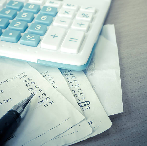 istock Close up of receipt paper and caculator, payment 475003498