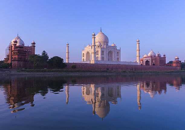 istock Taj Mahal sunrise with reflections 475004324