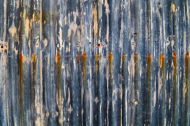 Rusty corrugated steel wall. stock photo