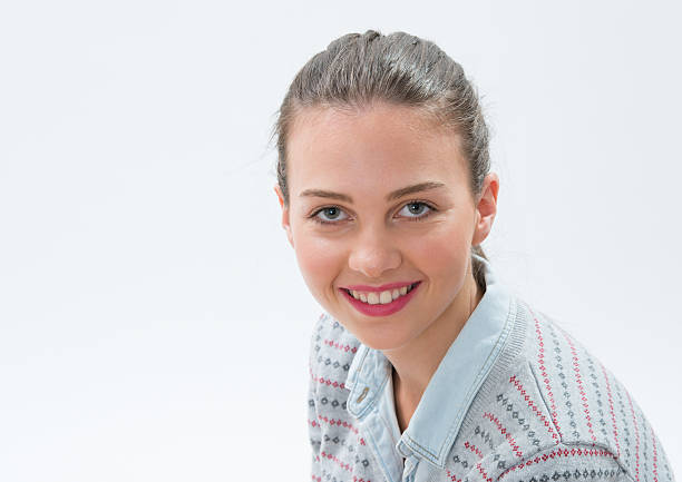 istock portrait of young woman 475007777