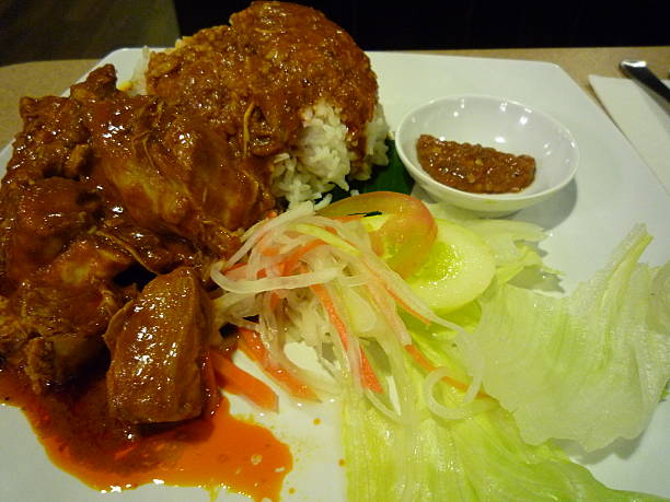 istock Delicious spicy chicken curry rice, malaysian cuisine 475009316