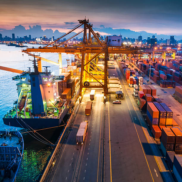 istock Container ship in the harbor in Asia , 475011410