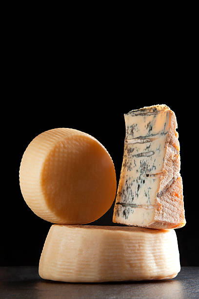 istock various types of cheese . parmesan and gorgonzola. on black 475012238