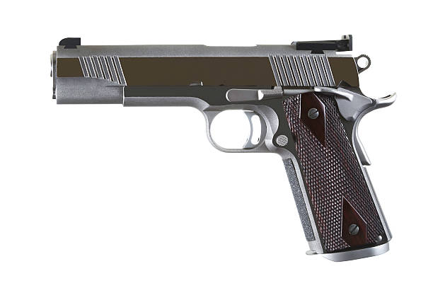45 Caliber Custom Competition Stainless Steel Automatic Pistol 45 Caliber custom match grade stainless steel automatic pistol isolated on white background forty five caliber handgun stock pictures, royalty-free photos & images