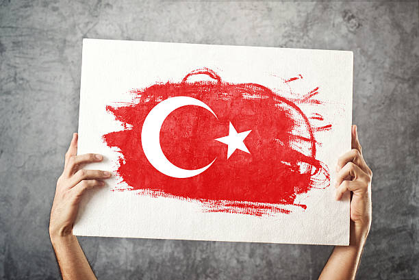 istock Turkey. Man holding banner with Turkish Flag. 475016017