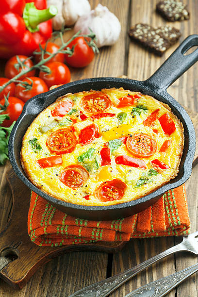 istock Omelet with vegetables and cheese. Frittata 475024593