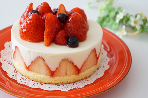 Strawberry cake on a plate.