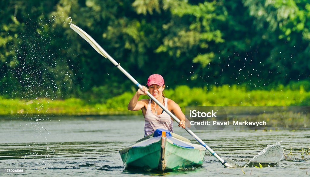 Girl canoeing Girl canoeingGirl canoeing 2015 Stock Photo