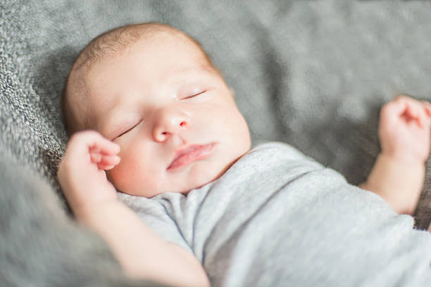 istock Cute newborn baby serie on grey 475033185