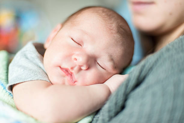 istock Cute newborn baby serie on grey 475033207