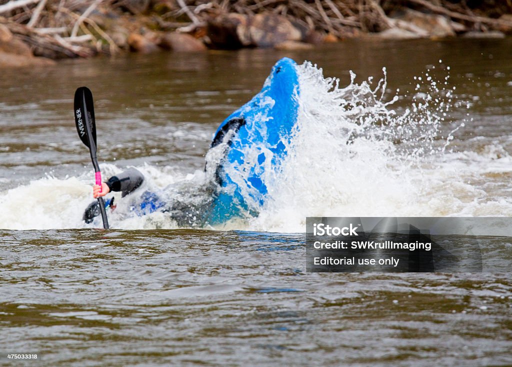 Paddlefest on the Arkansas River in Buena Vista Colorado Buena Vista, Colorado, USA - May 23, 2015: Whitewater boaters competing in events at Paddlefest 2015 in Buena Vista Colorado on whitewater rapids on the Arkansas River near South Main Street 2015 Stock Photo