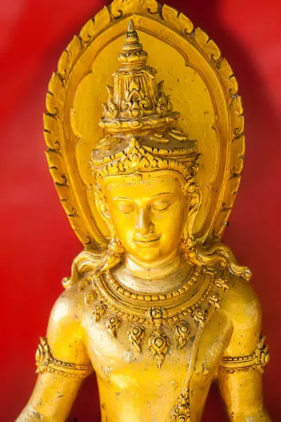 Large golden buddha goldleaf roof Buddhist culture and life style temple statues Asia