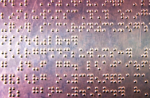 Metal sheet with braille dots background