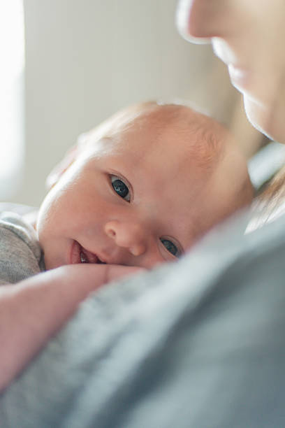 istock Cute newborn baby serie on grey 475034373