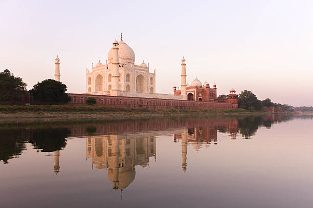 istock Taj Mahal sunrise with reflections 475034898