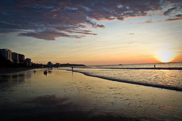 Beautiful clear sunset in touristic Murcielago beach, Manta, Ecuador