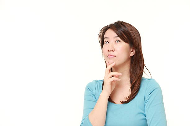 istock Japanese woman thinks about something 475037550