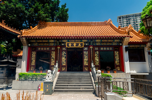 Hong Kong, China - April 15, 2015: The Three-Saint's Hall at the Wong Tai Sin Temple in Hong Kong. 