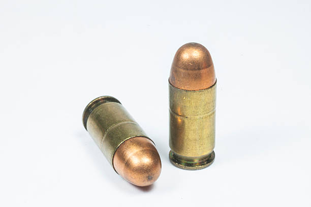 istock 11 mm. Black handgun And ammunition 475040945