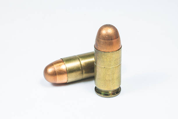istock 11 mm. Black handgun And ammunition 475041041