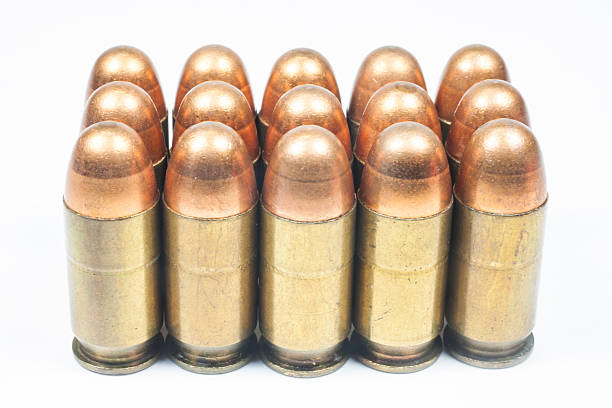 istock 11 mm. Black handgun And ammunition 475041409