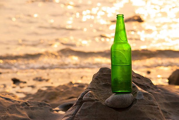 istock Bottles of beer on the rocks 475042878